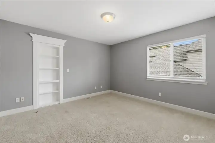 Third bedroom - the bookcase is actually a "secret door" into the same play room accessed from the second bedroom.