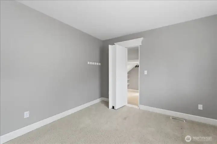 Third bedroom with the bookcase "secret door" open to the play room.