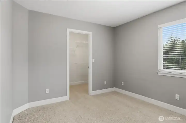 Opposite view of the fourth bedroom with walk-in closet.
