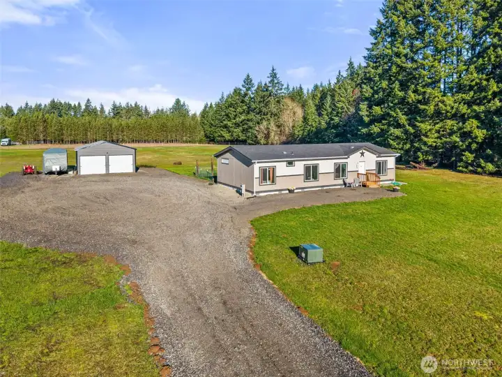 4.81 acres. Built in 2023, 3 bed, 2 bath 1566 sq ft. w/24X30 Shop.