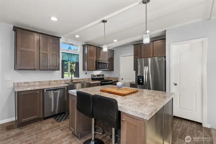 Kitchen with eat in space and island