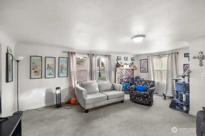 Lots of natural light and wood fireplace to warm the entire home