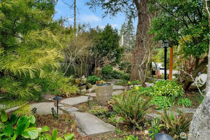 Park like front yard with paths