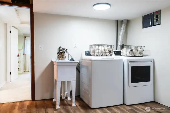 Laundry area, with wash-tub sink, accessible from bonus room, could easily be enclosed with sliding doors
