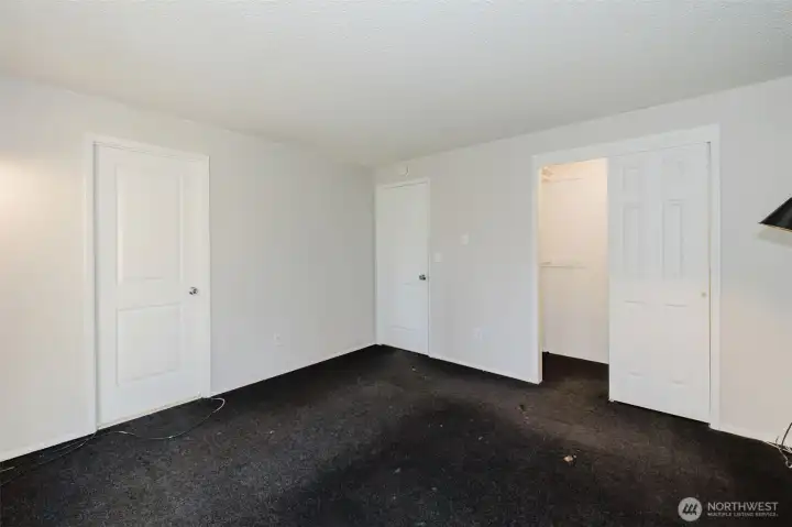 primary bedroom with closet view