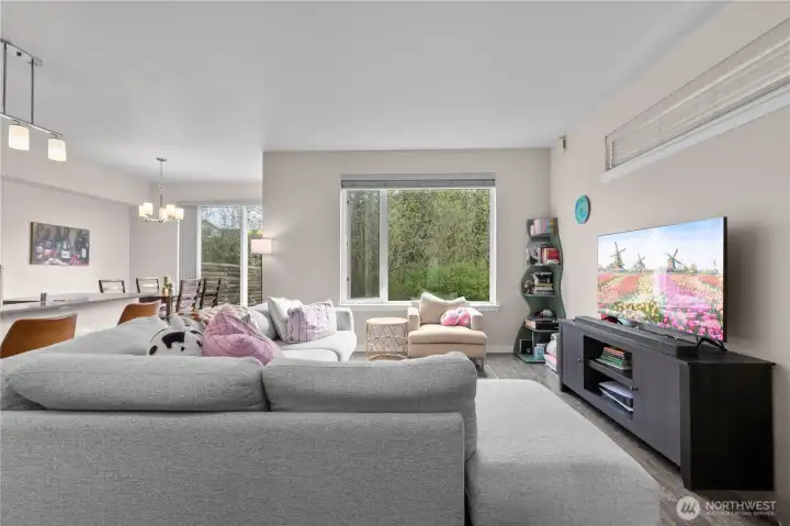 Bright large windows flank the rear of your private living area.