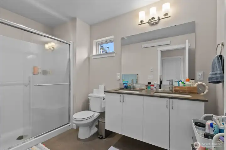True primary suite with step-in shower.