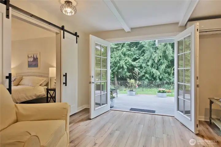 french doors lead to outdoor back deck