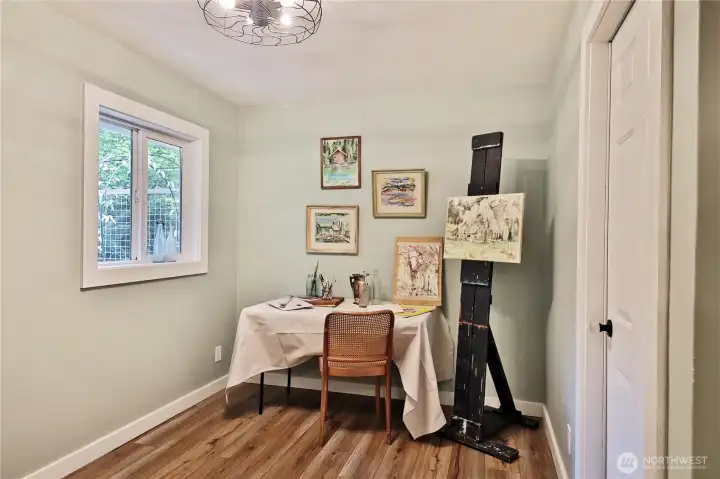 bonus room! creative space?home office? door to right leads to garage. Stackable washer/dryer in bonus room
