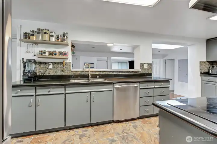 Whether cooking a gourmet meal or tossing a pizza in the oven, you will love being the chef in this kitchen!