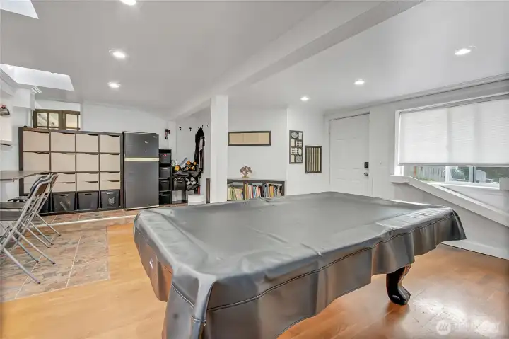 Bonus area currently has a pool table and shelving. The shelving can be removed for access to the front living room.