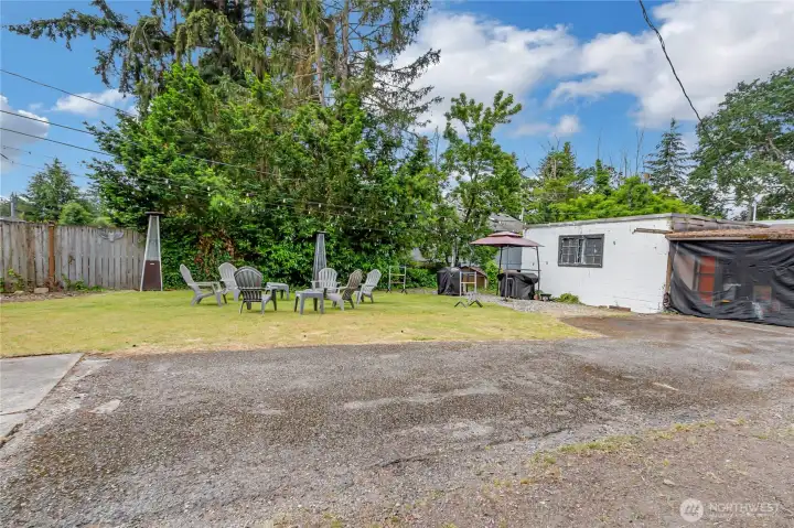 Oversized lot provides lots of space to gather, entertain, BBQ, and garden.