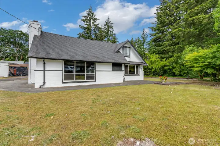 Surrounded by beautiful mature landscaping.
