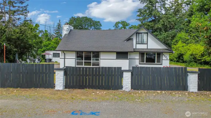 Modern styling to a traditional picket fence front.