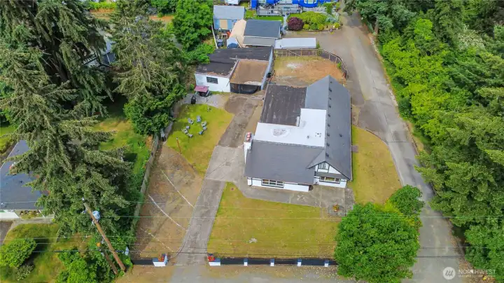 Overhead view of the property. Note the parking spaces for all your vehicles on the left side of your property.