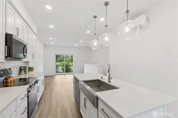 Stylish kitchen and living area with stunning views off balcony! Stylish kitchen and living area with stunning views off balcony!