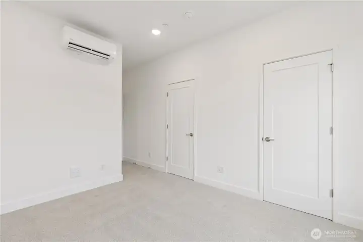 Primary suite with mini split. Primary suite with mini split.