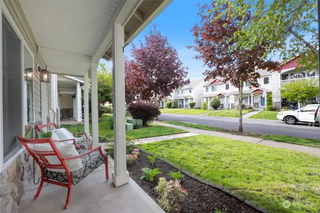 This adorable neighborhood has level sidewalks lined with cherry trees, plus streetside parking for guests just steps away from your new front door. Note the handsome new porch light fixture just installed last week!