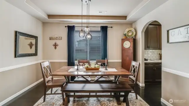 Dining room is conveniently located next to the kitchen.