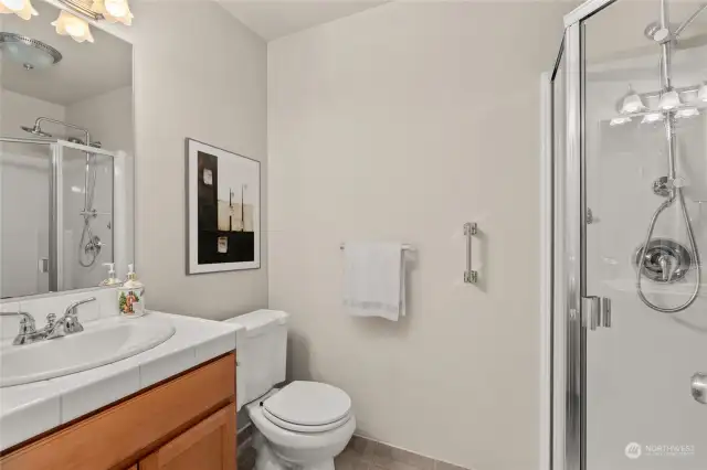 Main Floor Bathroom with Shower  (Digitally Staged)