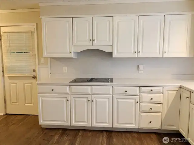 KITCHEN, REAR DOOR ACCESS  TO BACKYARD DECK