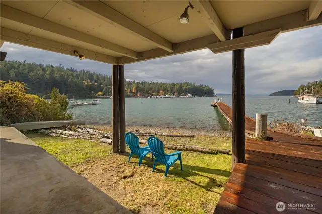 Lawn leading to low bank beach.
