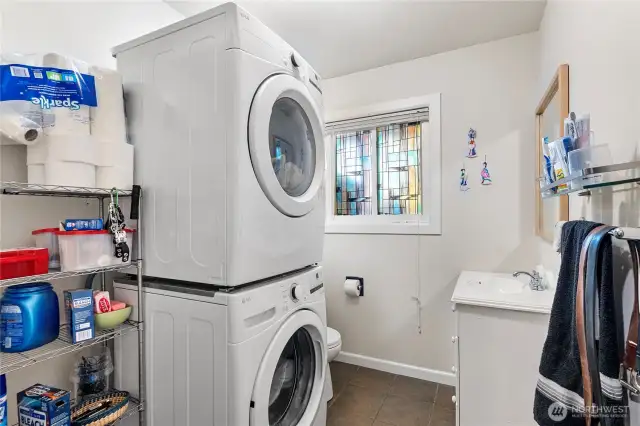 Lower level laundry with 1/2 bath