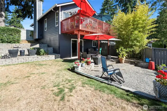 Yard large enough for playing, gardening, and entertaining