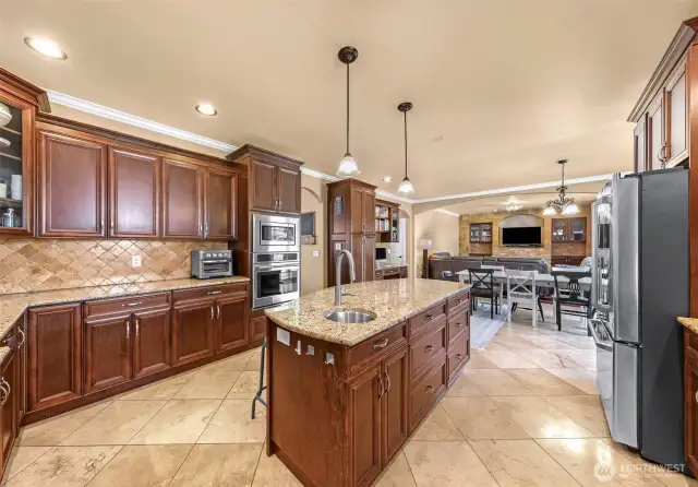 Island with sink and counter seating