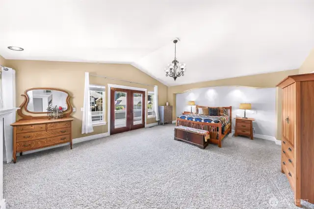 Massive primary suite has a private balcony