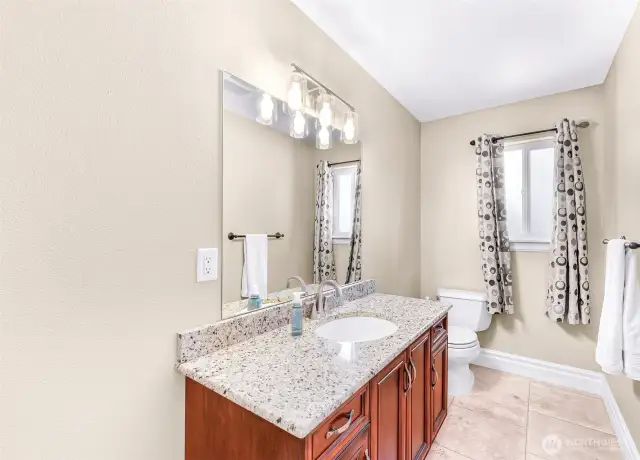 Half bath off of the bonus room