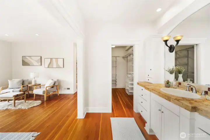 Another view of the primary bathroom and walk-in closet.