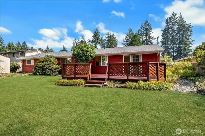 Large Backyard With Nice Deck For Entertaining