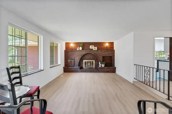 Living Room With Beautiful Brick Wood Burning Fireplace