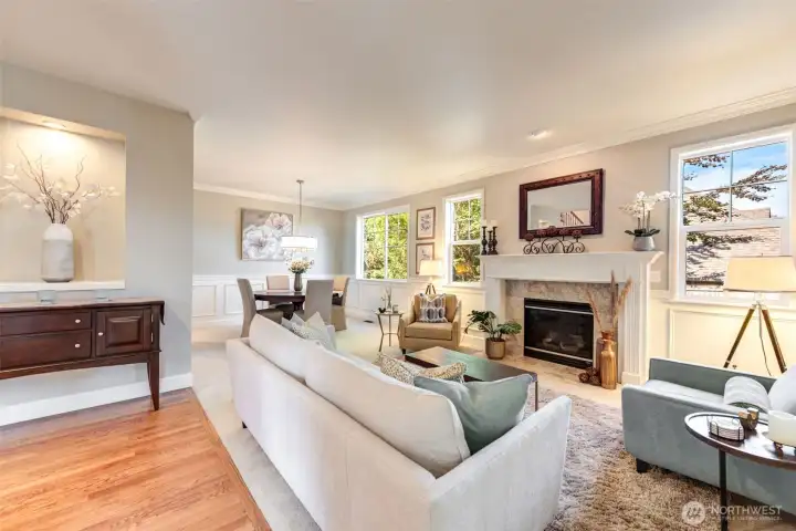 “Entry opens to living and dining rooms with hardwood floors and abundant natural light.”