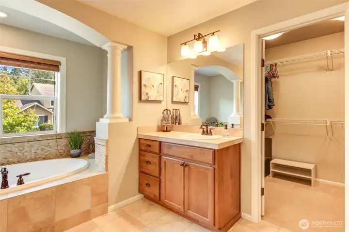 “Extra-large walk-in closet with abundant storage and organization space.”