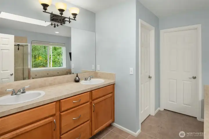 Primary 5-piece bath with good size walk-in closet