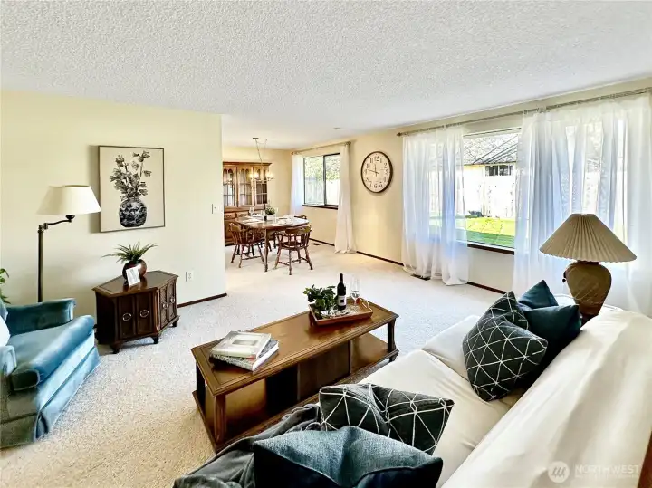 View of the formal rooms both with lovey views of the rear yard.