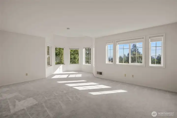 Light filled master suite with sound and mountain views.