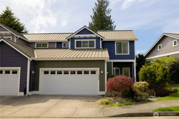 2-Story Townhouse with 2 car garage and 2 additional parking areas in driveway or on the adjacent street