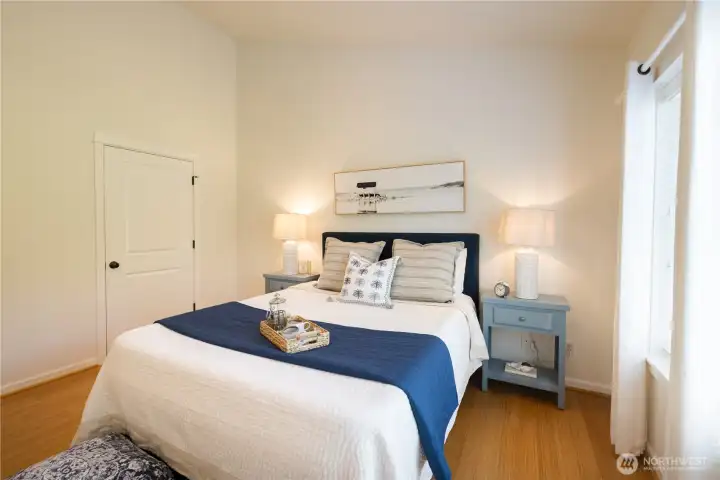 Great Main Floor Primary Bedroom with En-suite Bathroom and a walk-in closet.