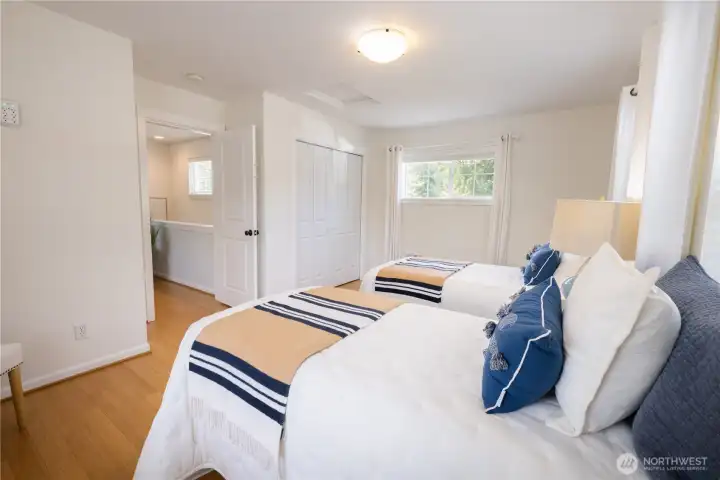 Spacious second bedroom with closet.