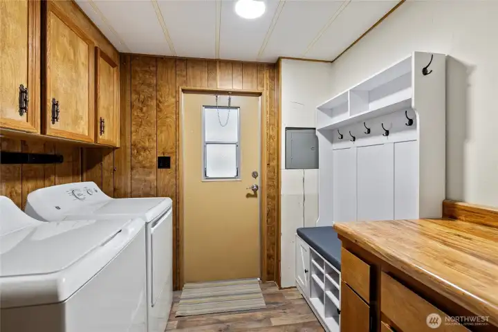 Laundry Room with New Washer and Dryer. Nice Mud Room bench with shoe and coat storage. Lots of Storage