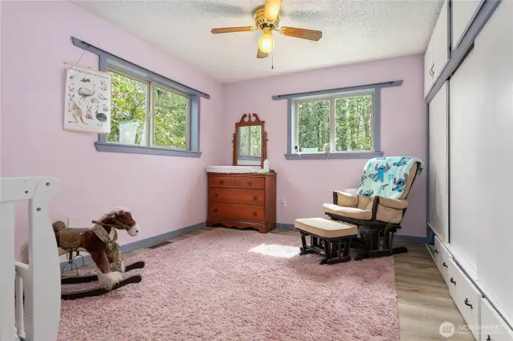 Main floor bedroom is used as a child’s bedroom, but could be the primary.