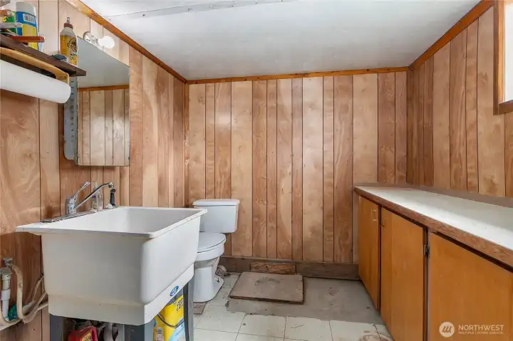 Decent sf space to make this 1/2 bath into a full or 3/4 bath.