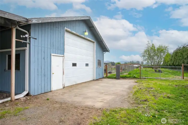 Another view of the man and Bay door into the shop.