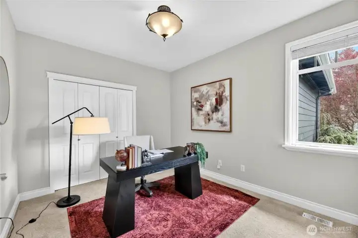 Den/ office or  5th bedroom guest suite on the main level.