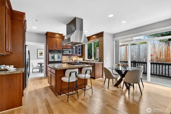 Kitchen /great room with eating nook and access to the private deck and back  yard.
