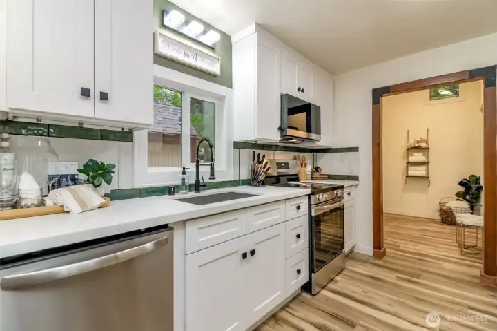 The utility room is off the kitchen.