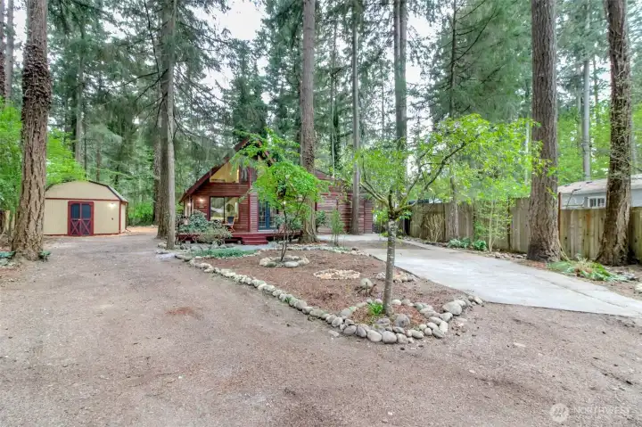 Huge front yard with loads of off-street parking and beautiful easy maintenance landscaping.